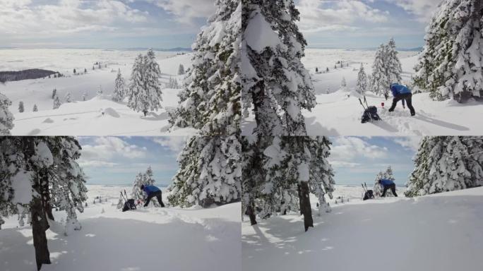 无人机山地徒步旅行者在白雪皑皑的斜坡上自己做饭