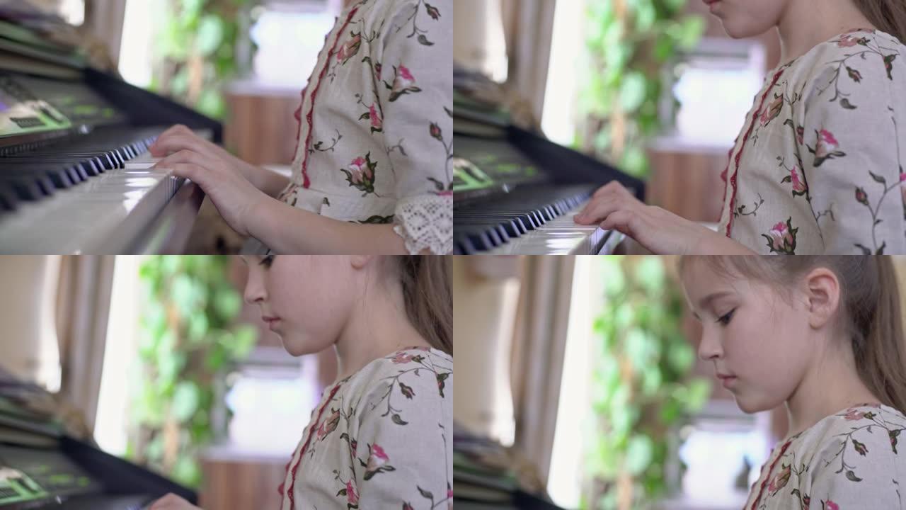 女孩在钢琴上演奏音乐