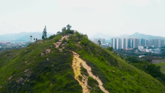 香港天水围的山峰城市全景飞过山顶城市高楼