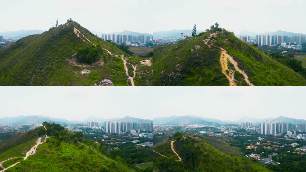 香港天水围的山峰城市全景飞过山顶城市高楼