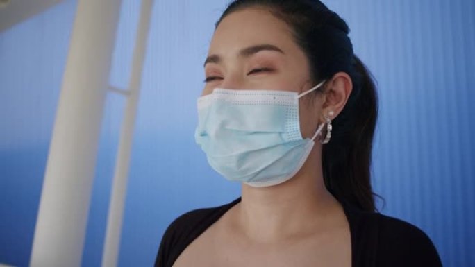 CU枪杀亚洲女子戴防护口罩微笑