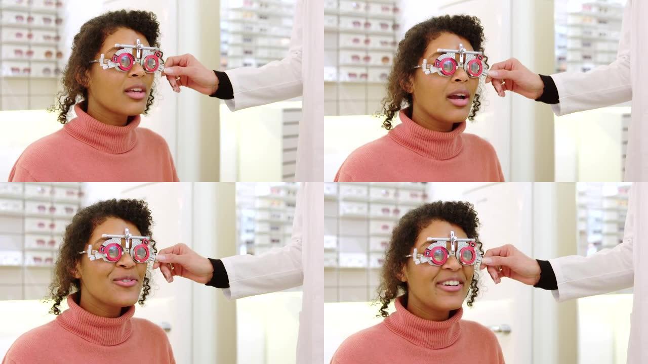 在眼镜店进行视力测试的年轻女子