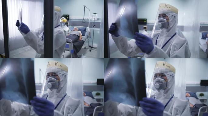 医生检查冠状病毒患者附近的肺部扫描
