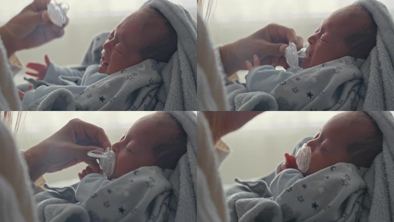 4k录像妇女将奶嘴放在婴儿的嘴里