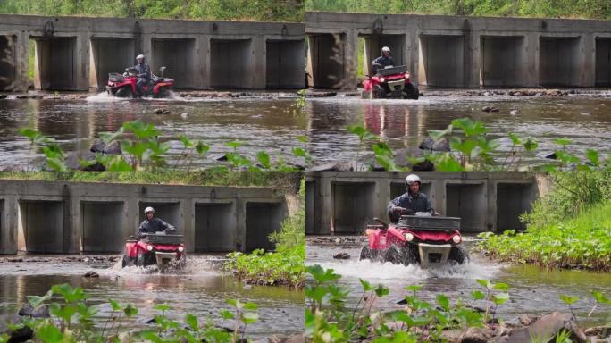 男子骑着四轮摩托在河上行驶