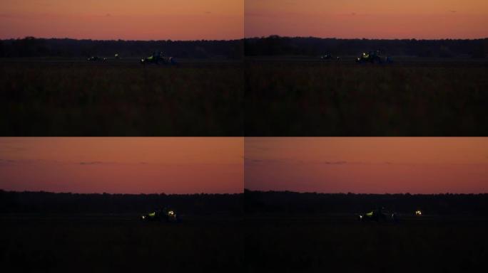 黄昏后在田间工作的SLO MO农民