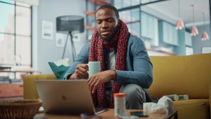 生病和疲倦的黑人非洲裔美国人打电话到办公室，用舒适的客厅的笔记本电脑上的视频通话。生病和恶心的男性穿