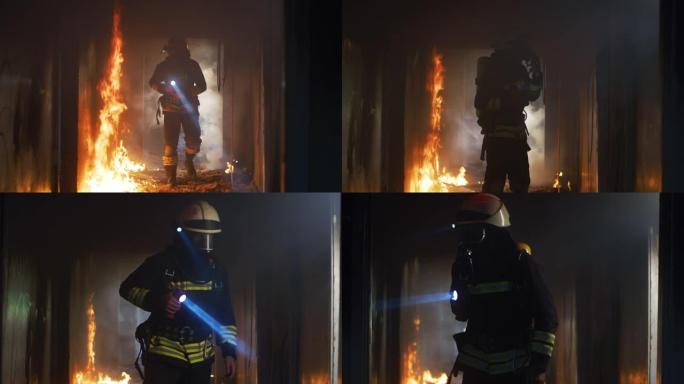 消防员在救援任务中检查燃烧的走廊