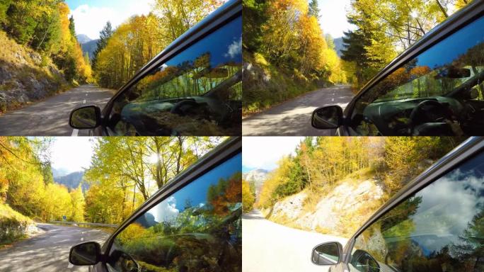 在山上行驶穿过五颜六色的秋天森林