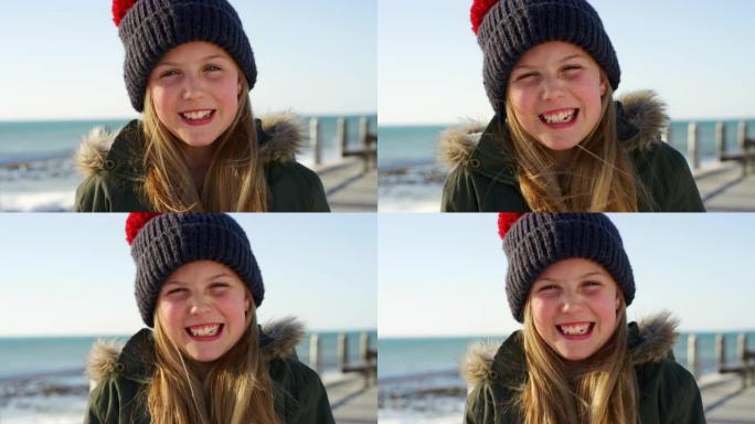 脸，女孩和孩子在beanie海滩上，保暖的衣服和寒假，在澳大利亚悉尼旅行，冒险和幸福。肖像，微笑和孩