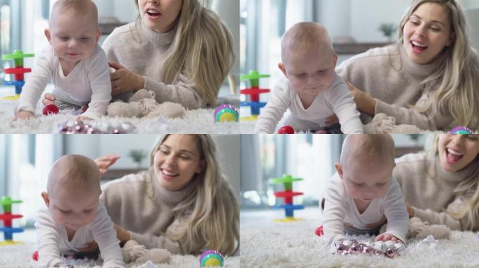 4k视频片段，一名年轻女子在家中与男婴玩耍