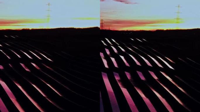 日落时光伏电站的无人机太阳能电池板