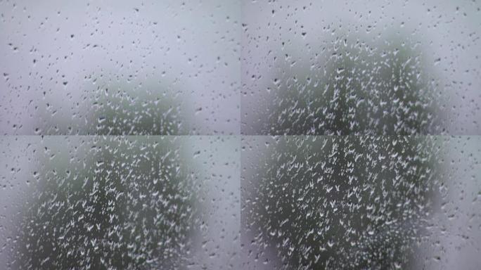 窗户上有水滴的背景，窗户上有雨滴。特写。