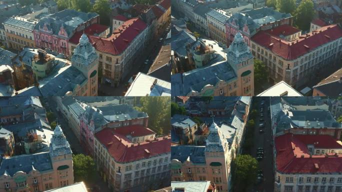 乌克兰利沃夫老城中心田园诗般的历史建筑的电影空中拍摄，宁静的夏季日出街道