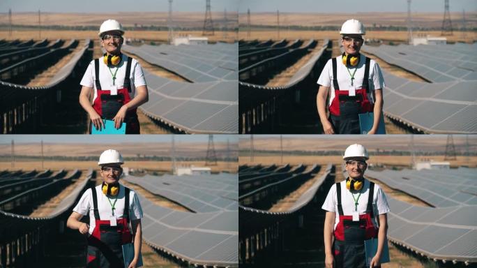 太阳能行业工人站在太阳能公园。替代，绿色能源工作者。