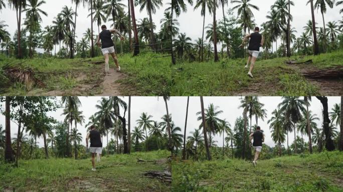 男子在热带森林中奔跑