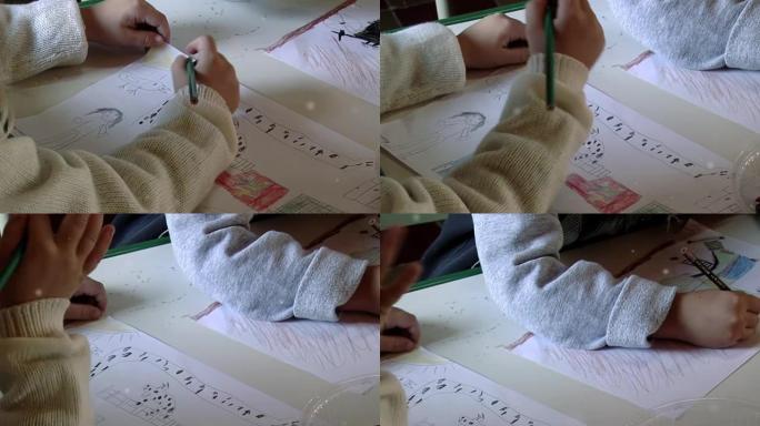 幼儿园的孩子在白纸上画画。特写。