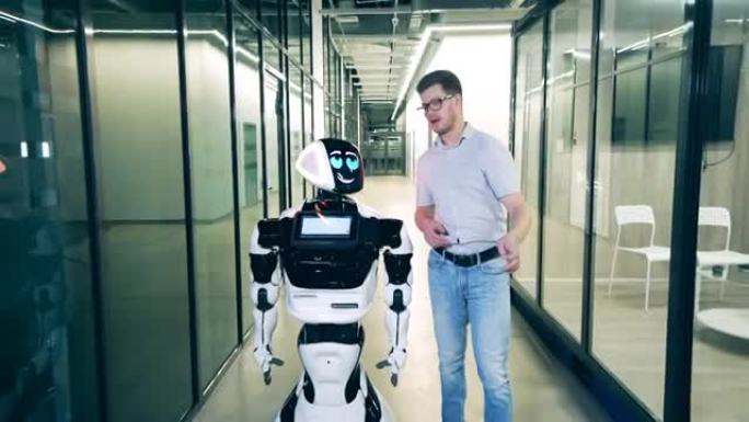 人与机器人交流概念。商人正在办公室里与机器人聊天