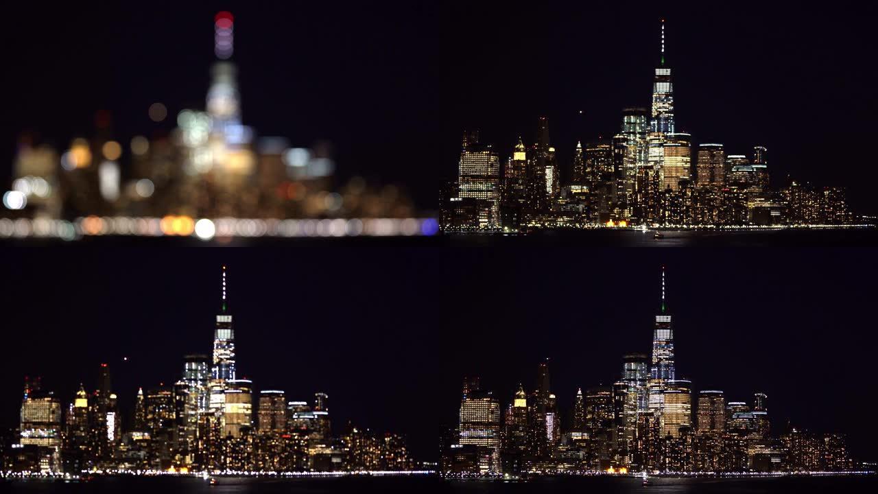 4K UHD模糊背景转移焦点: 高角度视角曼哈顿市中心天际线建筑城市景观在晚上。