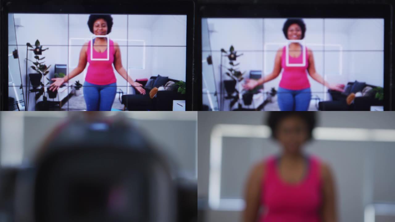非裔美国女性大码视频记录器录制了一段关于锻炼的视频