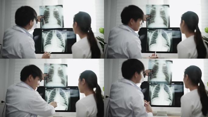 男医生在办公室咨询女患者时与x光片交谈