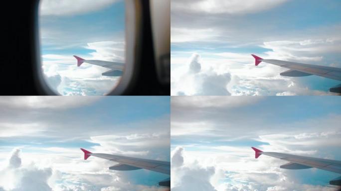 旅行者女人打开飞机上的窗户