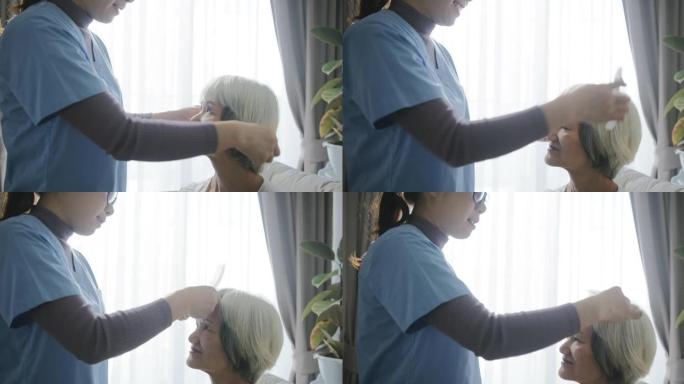 女性护理员梳理高级女性头发