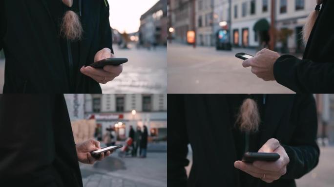 晚上在城市里用智能手机留着胡须的女士