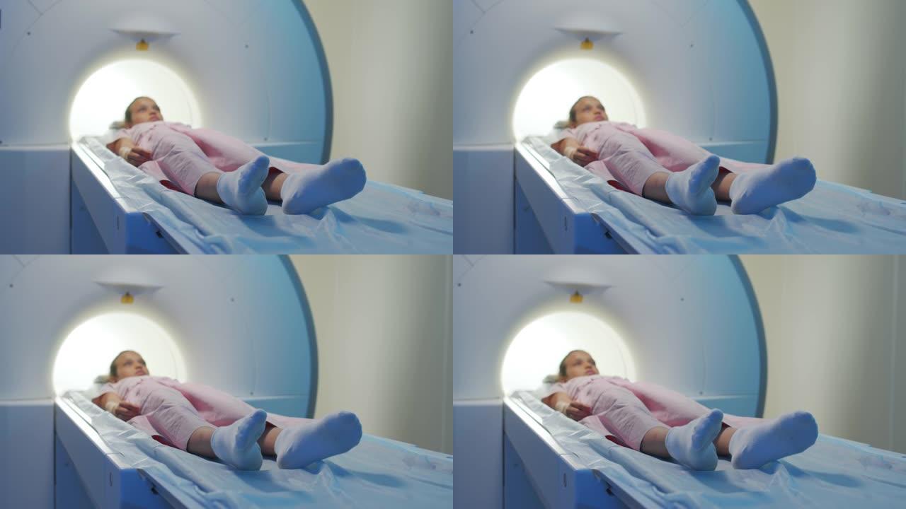 磁共振成像扫描仪上的小女孩