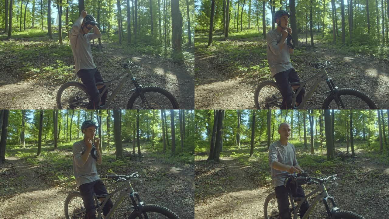 SLO MO MTB骑自行车的人在森林里摆姿势