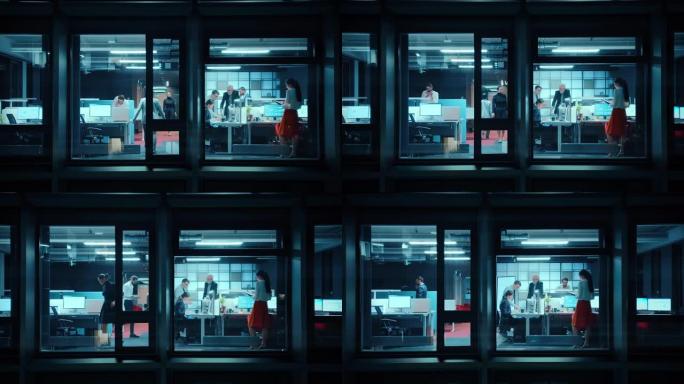 窗外的镜头: 在办公室工作的商人和女商人。经理和专家在晚上做金融业务。员工在计算机上工作并委派任务。