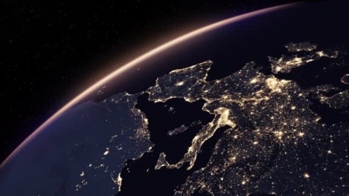 地球在晚上。夜城的美景在地球上发光。欧洲和非洲大陆自然概念的现实3d动画。从太空轨道看行星地平线