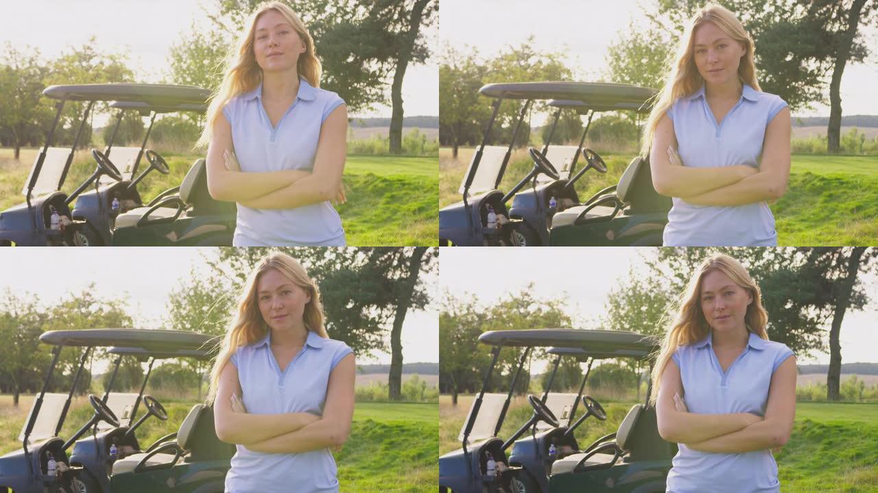 站在高尔夫球场上的女高尔夫球手的肖像
