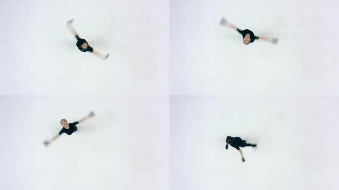 年轻女孩在俯视图中滑冰时正在旋转