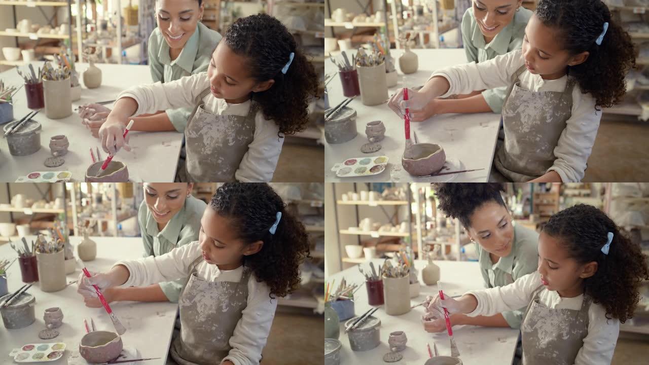 陶瓷班，车间里的女人和孩子画碗，创意课和工艺工作室，用于技能，创造力或学习。美术课上的年轻女孩，儿童