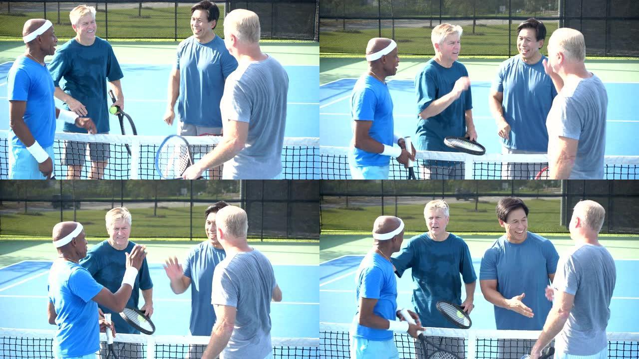 男子在比赛后打网球，击掌和握手