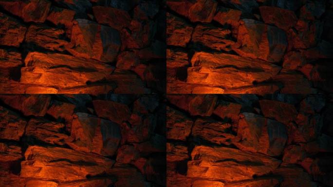 火光照亮岩石洞穴墙
