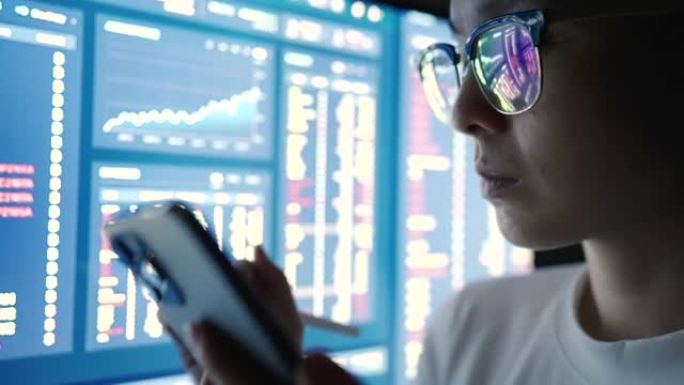 亚洲女商人在电脑上分析股票数据