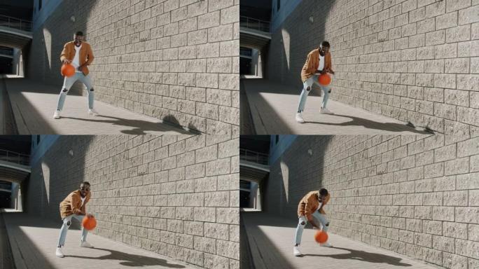 快乐的非洲裔美国人打篮球，微笑着享受户外休闲时光
