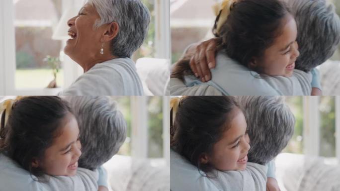 快乐的女孩用拥抱问候祖母奶奶微笑着拥抱她的孙女享受孙子在家拥抱家庭概念4k