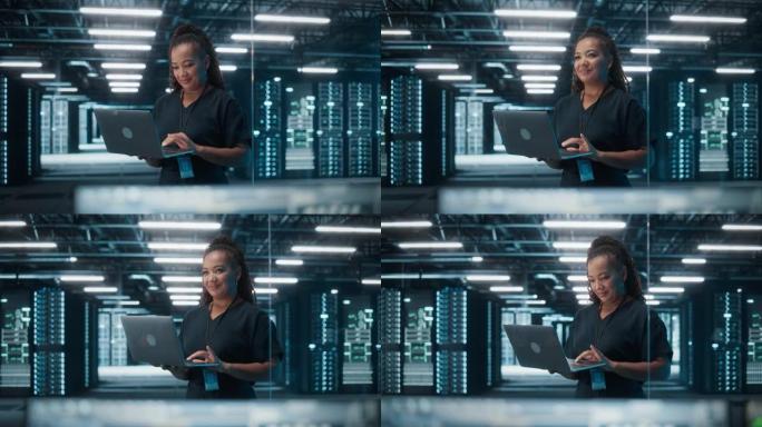 成功的非洲裔美国女性IT专家的肖像使用笔记本电脑，站在数据中心。系统管理员在Web服务上工作。云计算