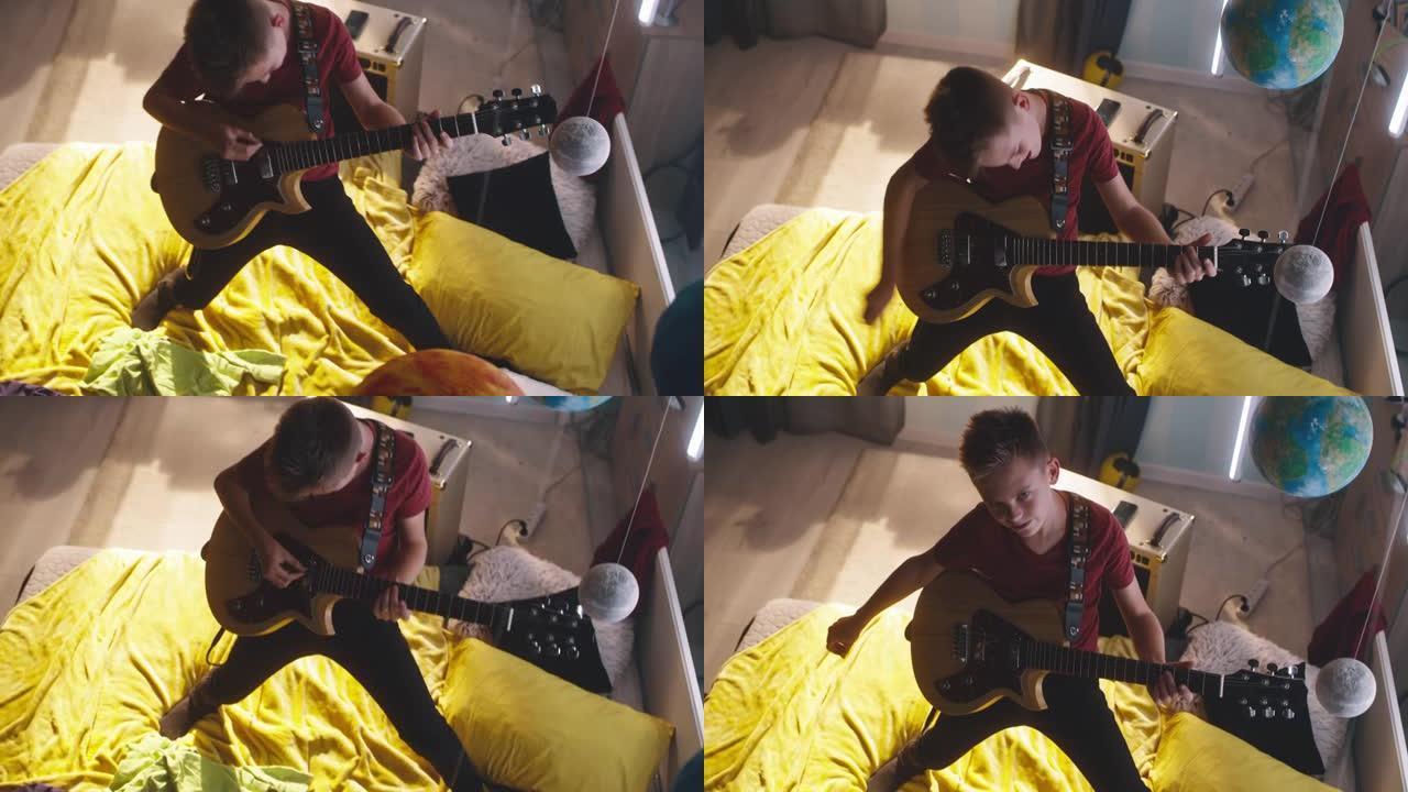 青少年在床上弹吉他