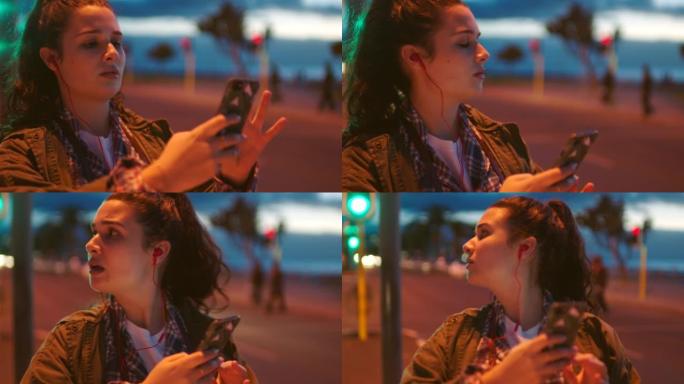 女游客晚上用手机GPS找到回家的路。一名年轻女子晚上在新城市迷路和困惑，并在手机上使用地图应用程序查