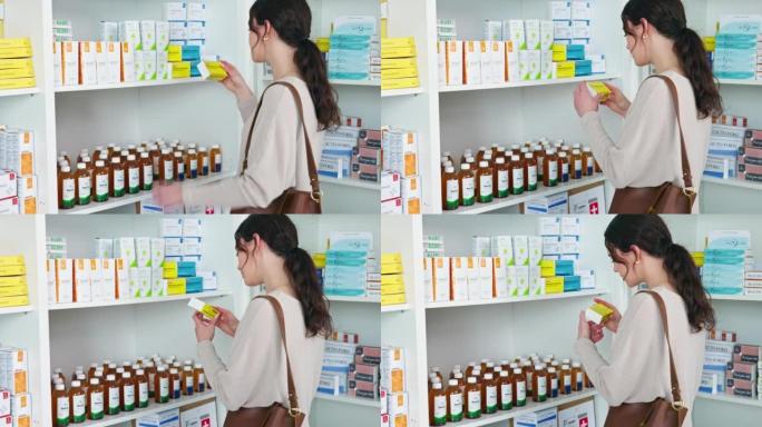 药房的顾客，在货架上选择药物并阅读标签以检查药物的安全性细节和副作用。女性购物者在零售药店浏览保健产