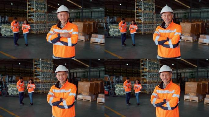 亚洲高级工人的肖像使用条形码扫描仪读取仓库中的库存。