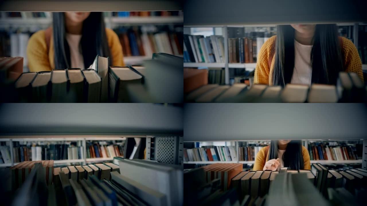 SLO MO年轻女子在图书馆的书架上寻找一本书