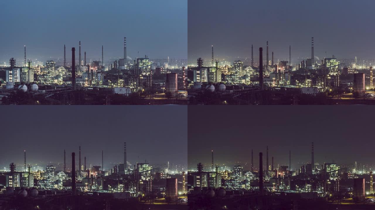 石化厂和炼油工业的T/L鸟瞰图，黄昏到夜晚的过渡