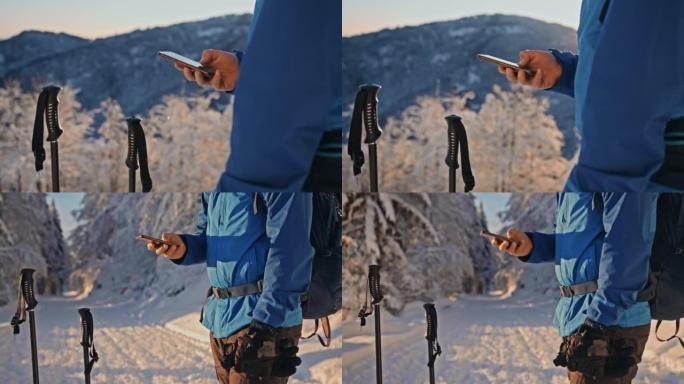 SLO MO Mountain hiker在山上使用他的智能手机