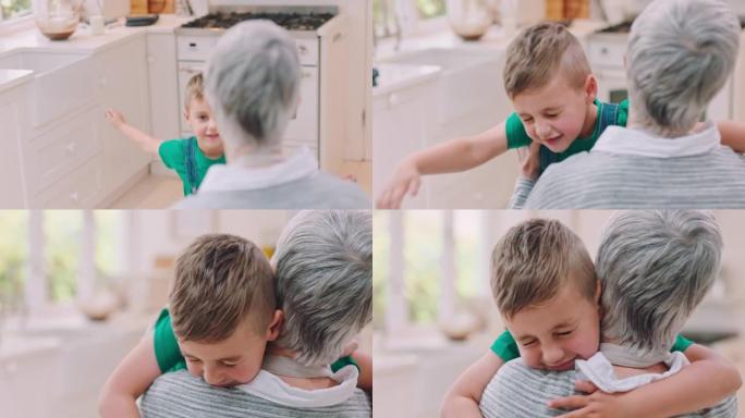 在家一起烘烤或做饭后，爱，照顾和男孩在厨房里拥抱祖母。快乐，微笑和充满爱心的孙子在现代房屋中拥抱一位