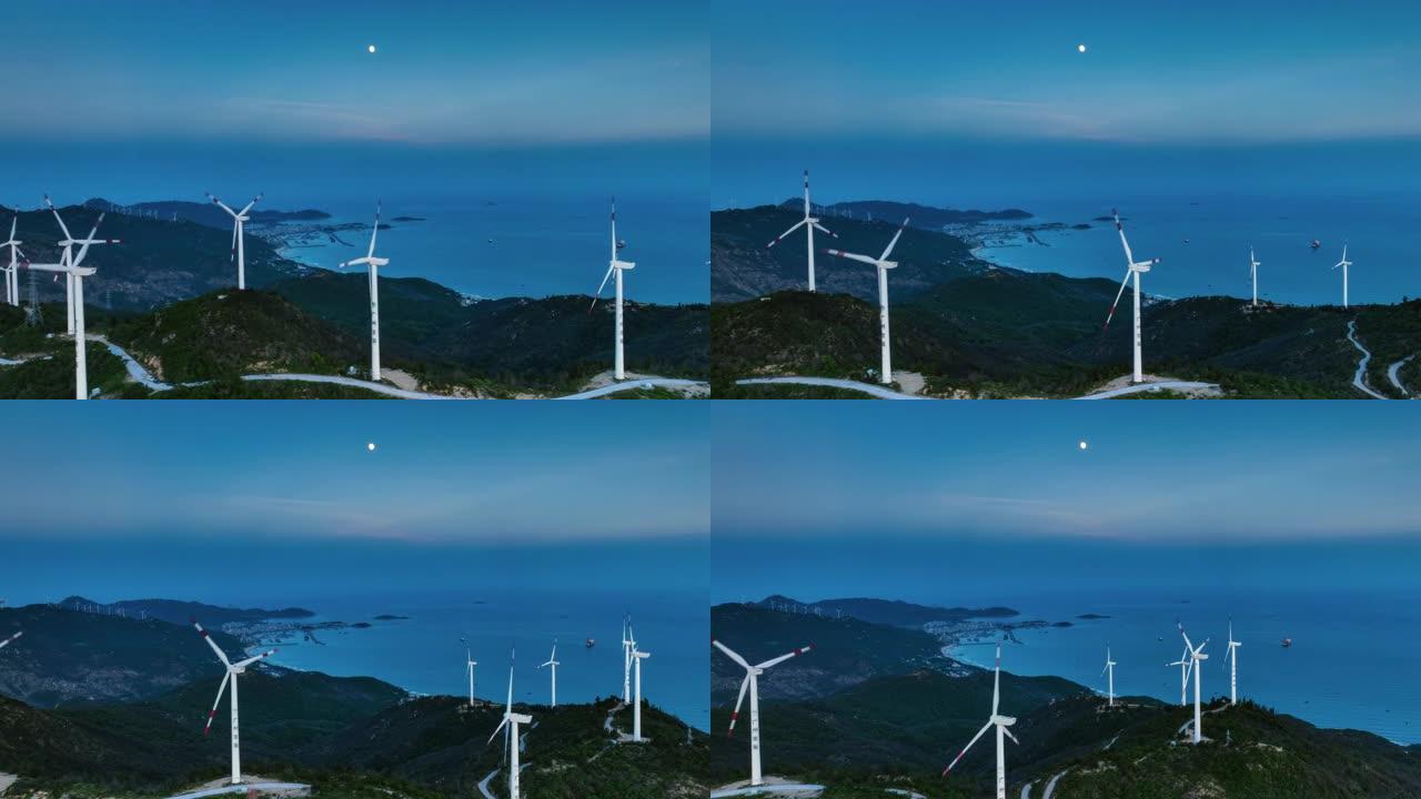 在月夜，风车遍布海边的山脊